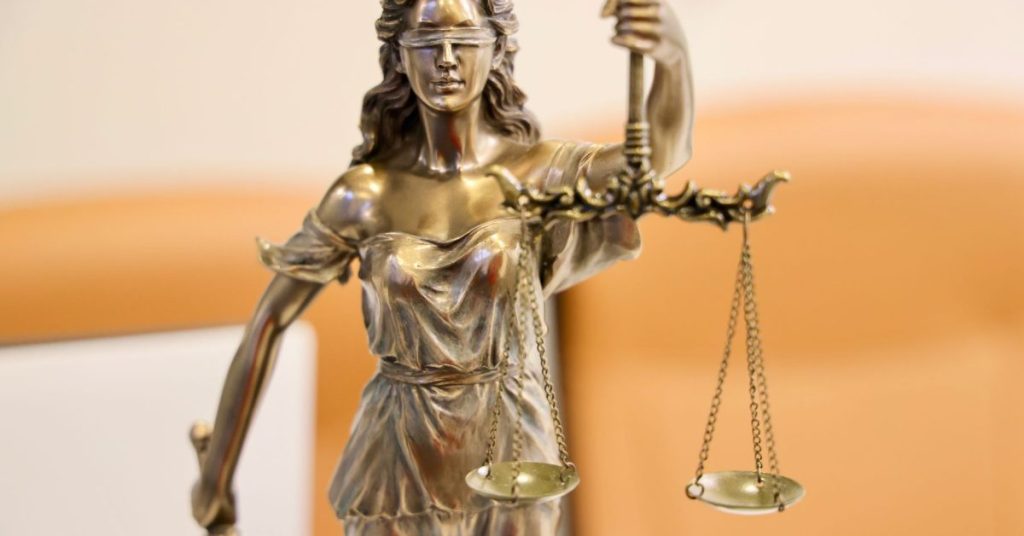 Lady Justice statue holding scales