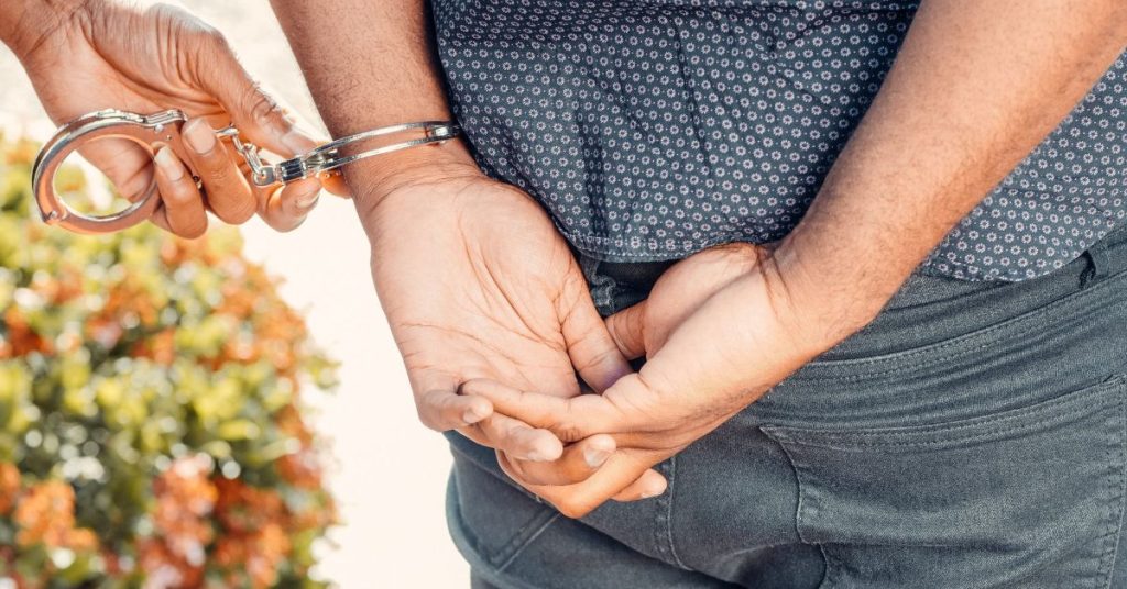 Person in handcuffs during an arrest