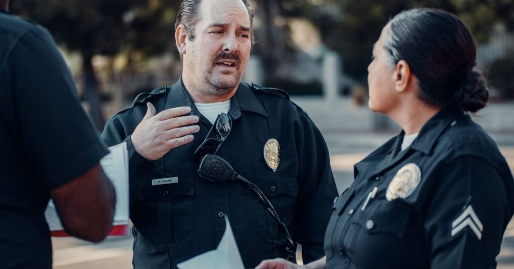 Police officers taking a report