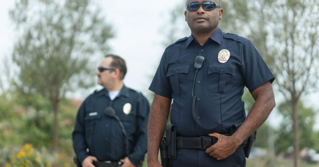 Two uniformed police officers